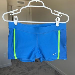 Nike spandex shorts (thicker material than spandex) but tighter than shorts